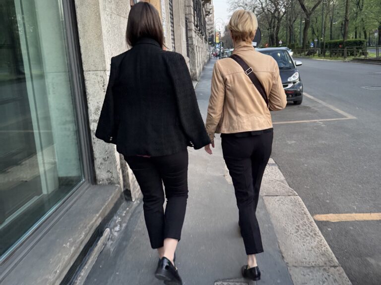 Feni Lab mentorship — two women walking together, representing women supporting women through guidance, shared wisdom, and personal growth.